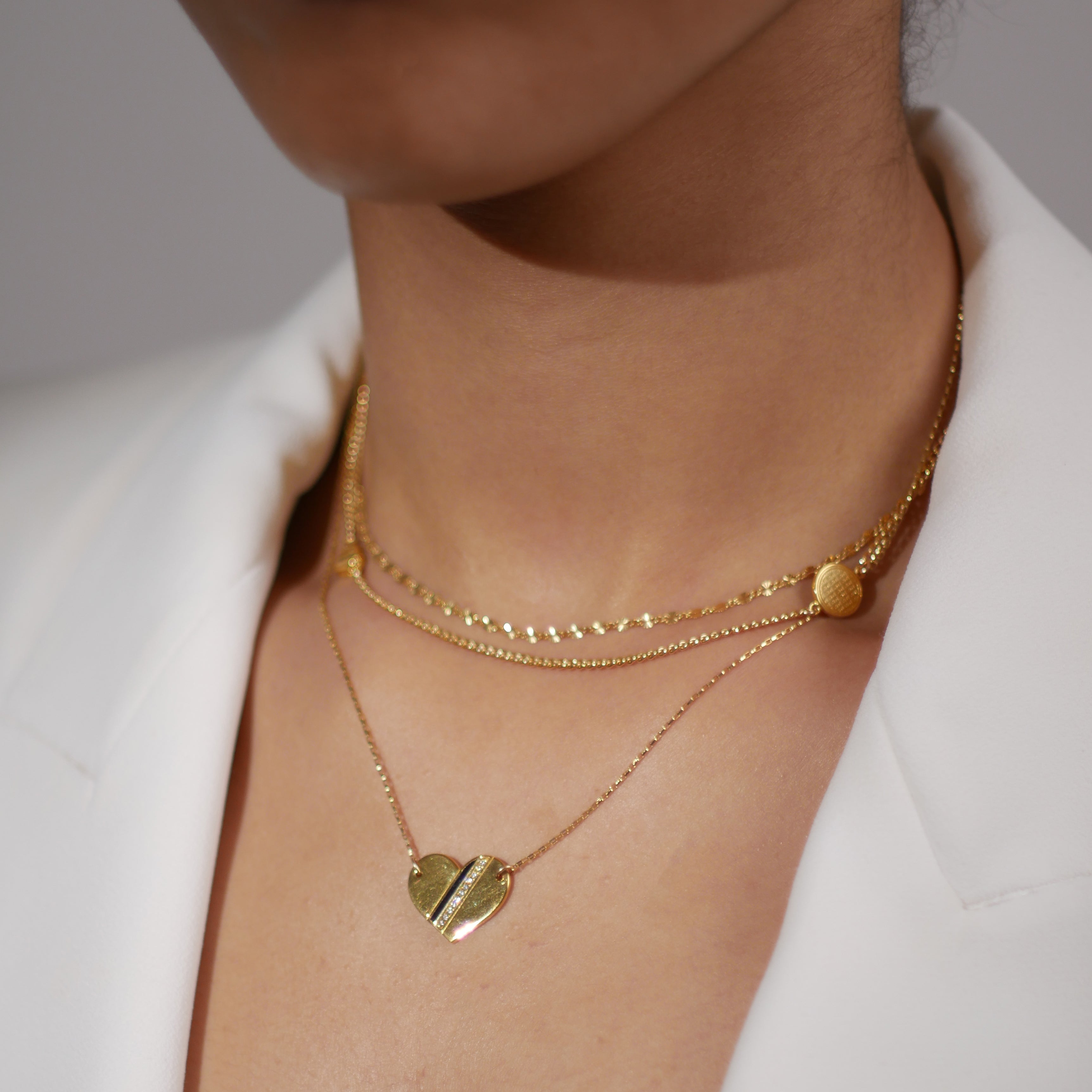 HOW TO LAYER NECKLACES TO ELEVATE ANY OUTFIT